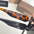 Elegant Serpentine-Inspired Sunglasses