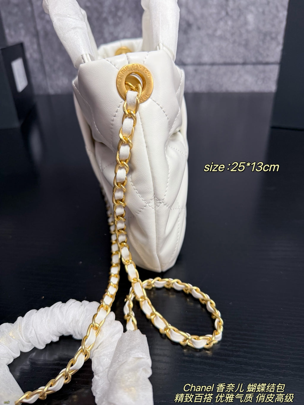 25K Bow Handle Bag — Quilted Leather