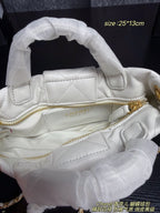 25K Bow Handle Bag — Quilted Leather