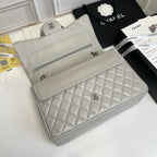 Maxi Quilted Flap Bag in Lambskin — 33cm