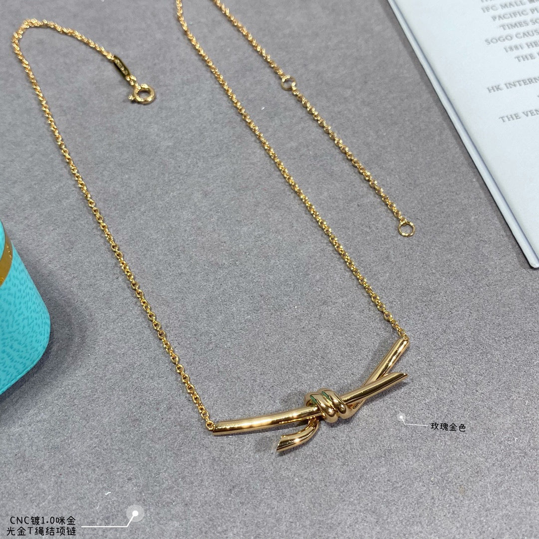 Ti*ffa*ny  Light Gold T Knot Necklace