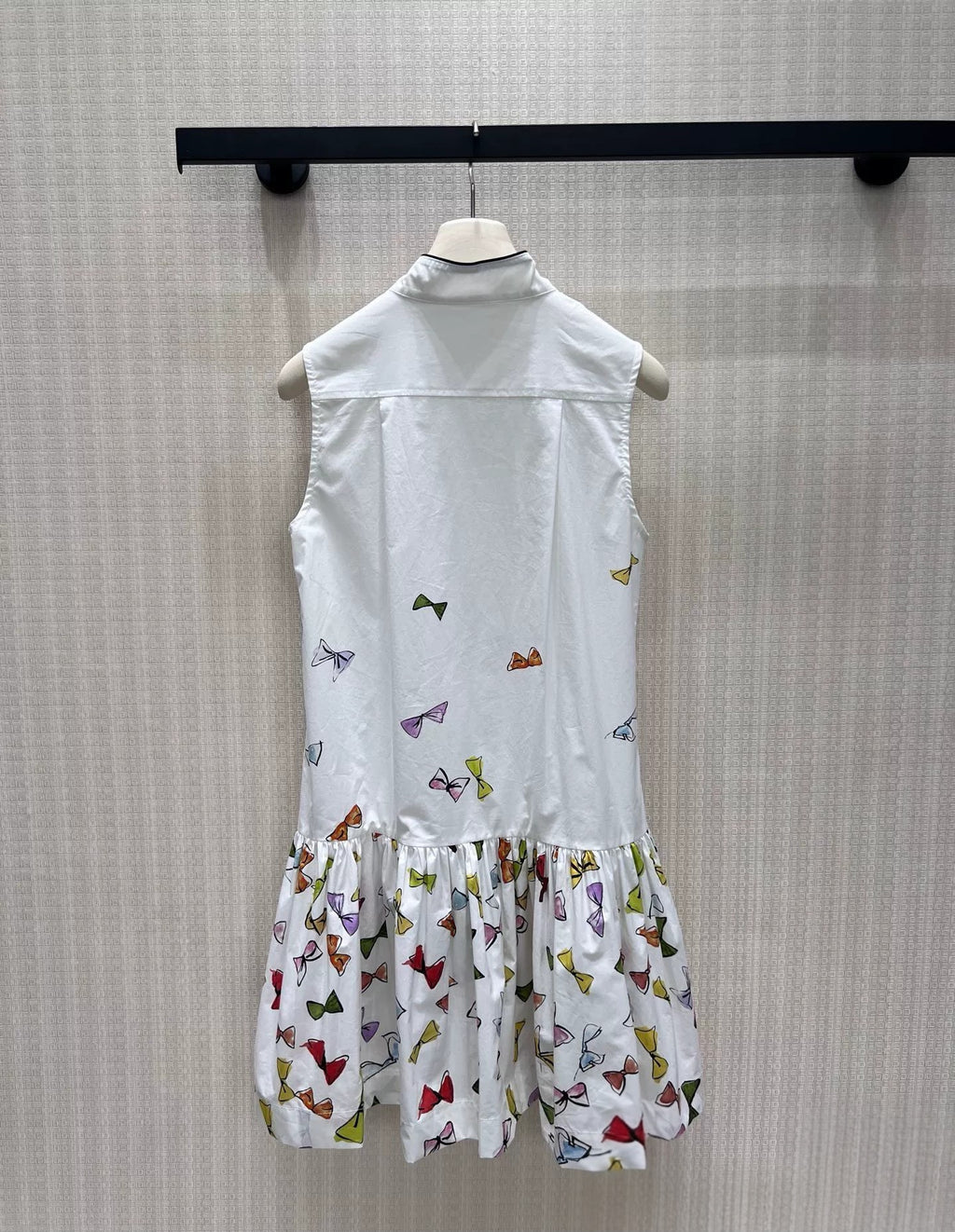 Bow Print Sleeveless Pleated Ruffle Hem Dress