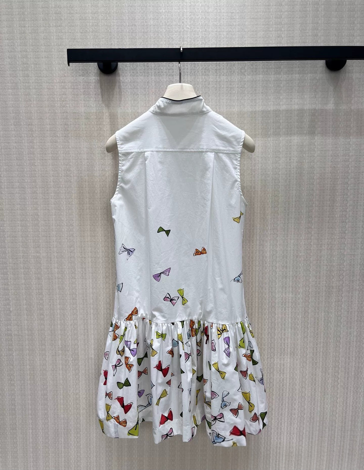 Bow Print Sleeveless Pleated Ruffle Hem Dress
