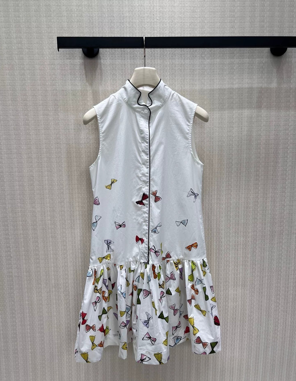 Bow Print Sleeveless Pleated Ruffle Hem Dress