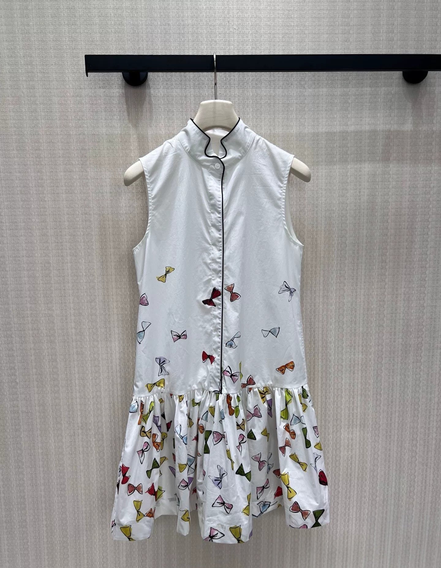Bow Print Sleeveless Pleated Ruffle Hem Dress