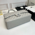 Maxi Quilted Flap Bag in Lambskin — 33cm