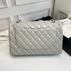 Maxi Quilted Flap Bag in Lambskin — 33cm