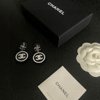 Logo Drop Earrings | Gold Tone