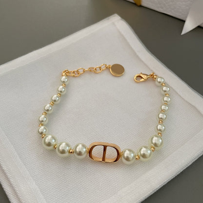 D*i*o*r Pearl Choker and Bracelet Set