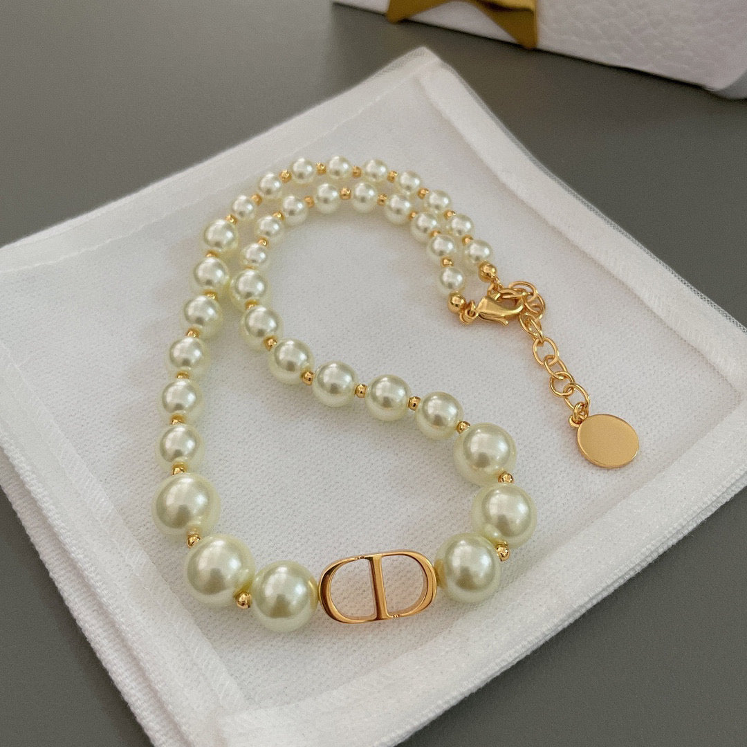 D*i*o*r Pearl Choker and Bracelet Set